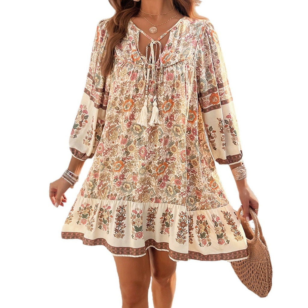 Apricot floral V-neck boho dress with tie neckline and tiered hem