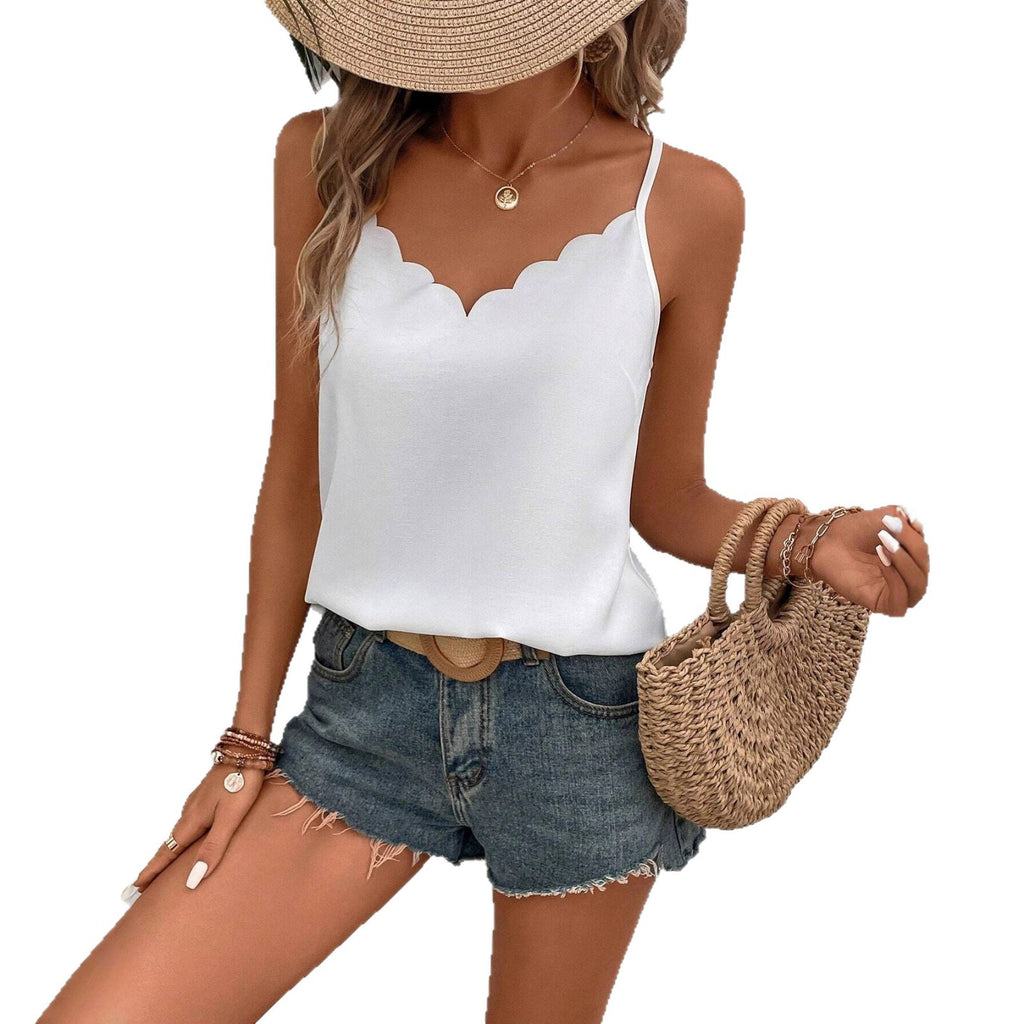 White scalloped V-neck tank top with spaghetti straps, fitted silhouette
