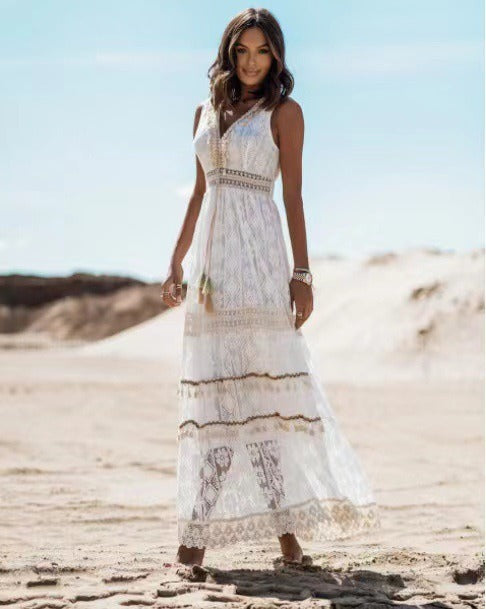 White boho lace swing maxi dress with V-neckline and scalloped tiered layers