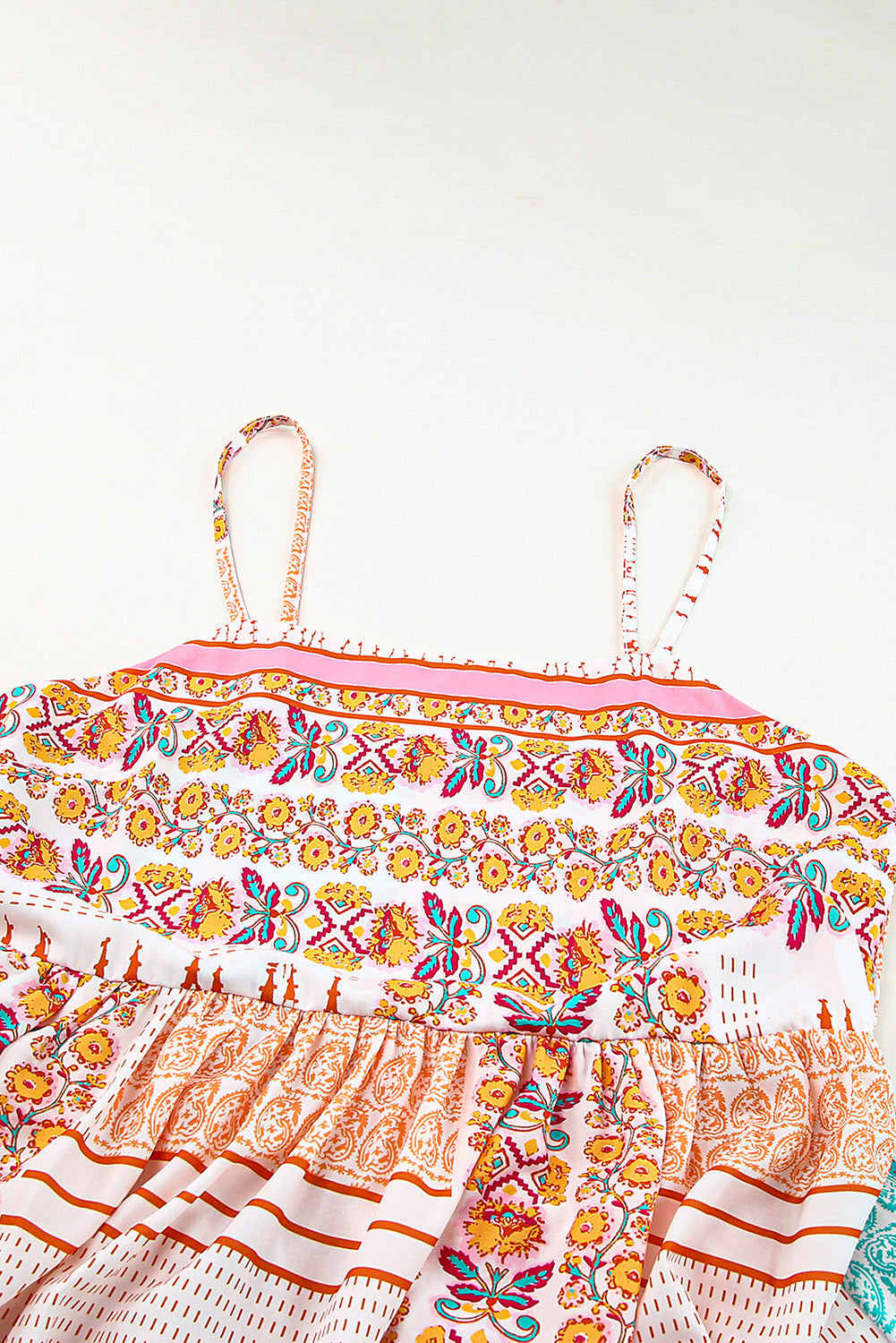 Patchwork sundress close-up of square neckline, multicolor embroidered yoke