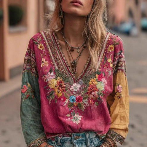 Rose red embroidered v-neck blouse with floral motif front and wide embroidered trim