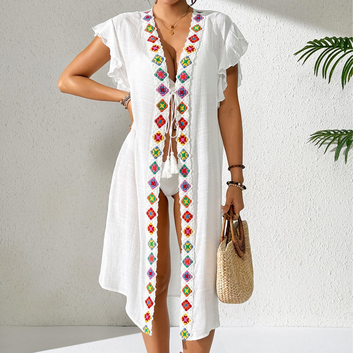 White womens beach cover-up with V neckline and colorful embroidered border, short ruffle sleeves