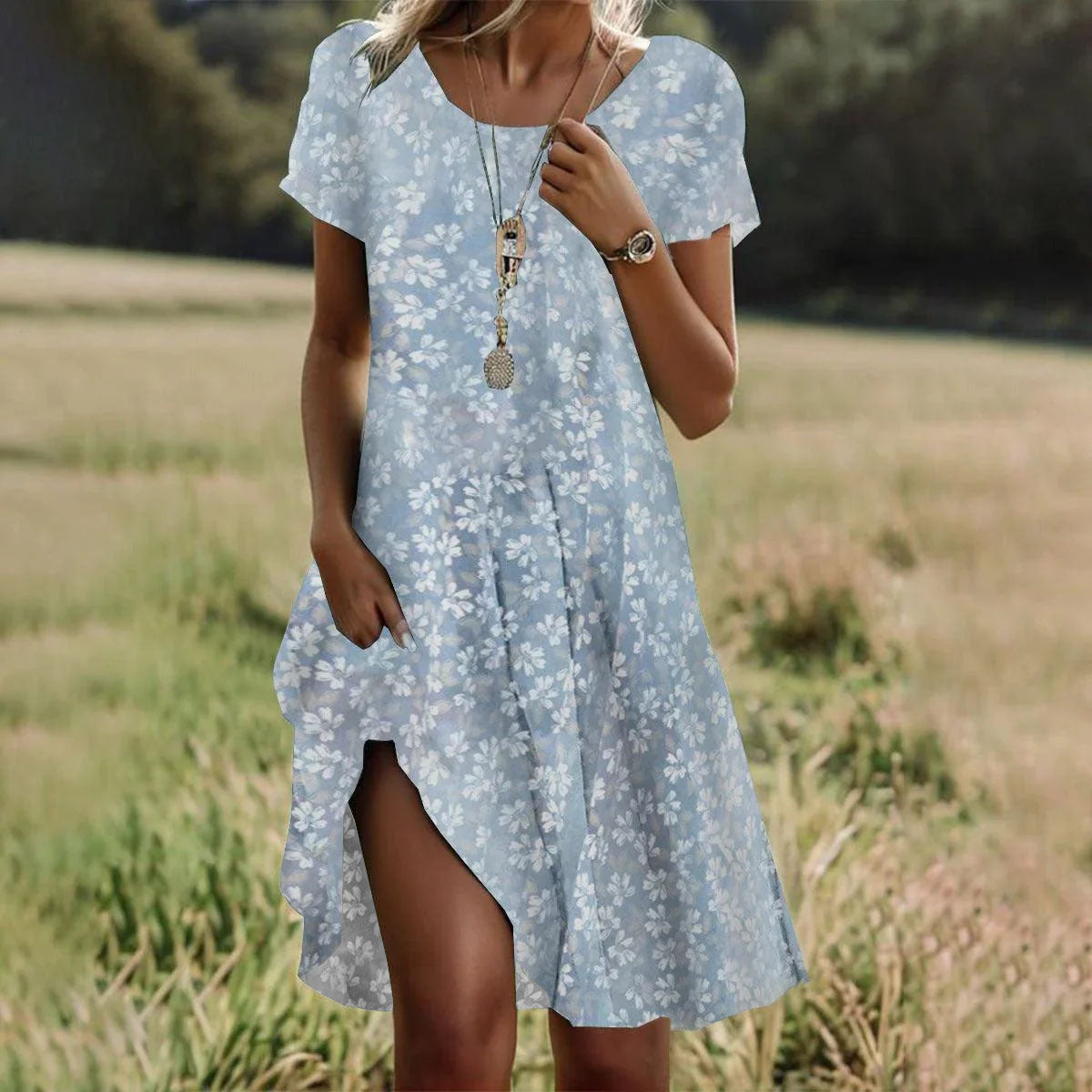 Light blue floral bohemian summer dress, round neck, short sleeves, mid-length with side slit
