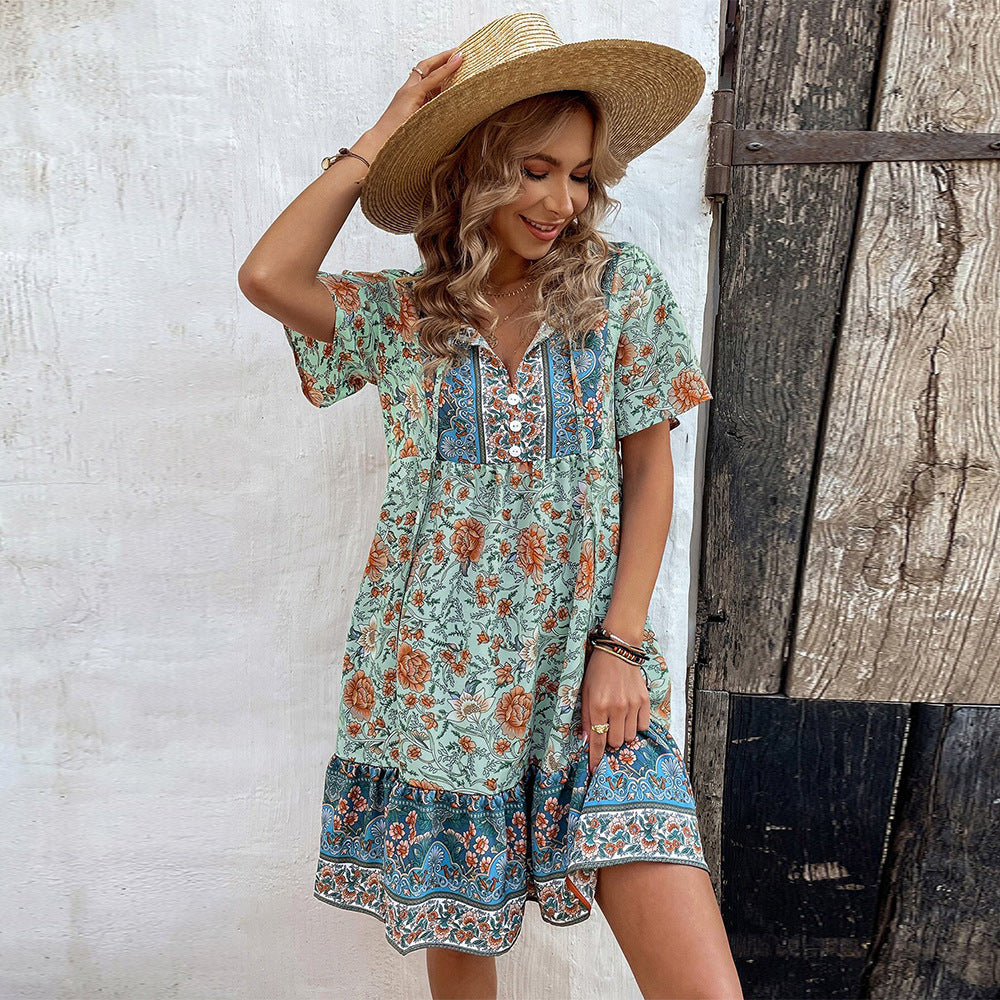 Teal green floral V-neck boho dress with short sleeves and border-print ruffles