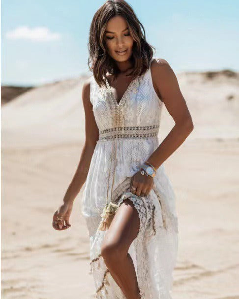 White sleeveless lace swing maxi dress with V-neck and tiered hem