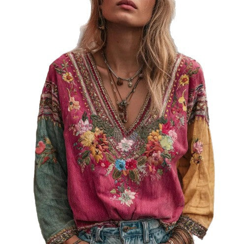Rose red embroidered v-neck blouse with long sleeves and floral neckline detail