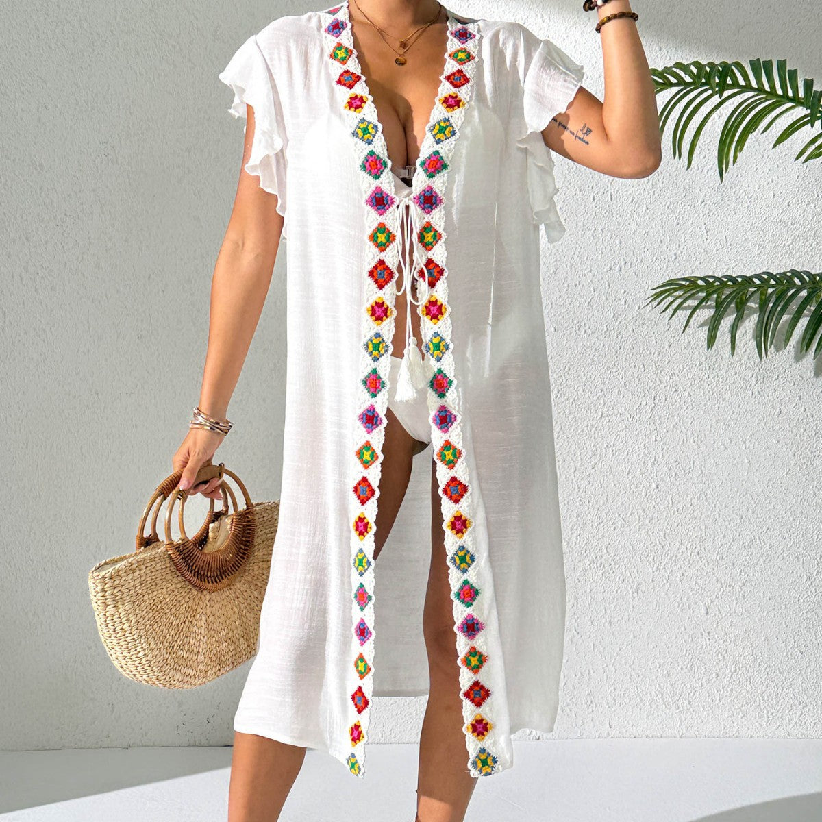White womens beach cover-up with colorful embroidered V trim and flutter short sleeves