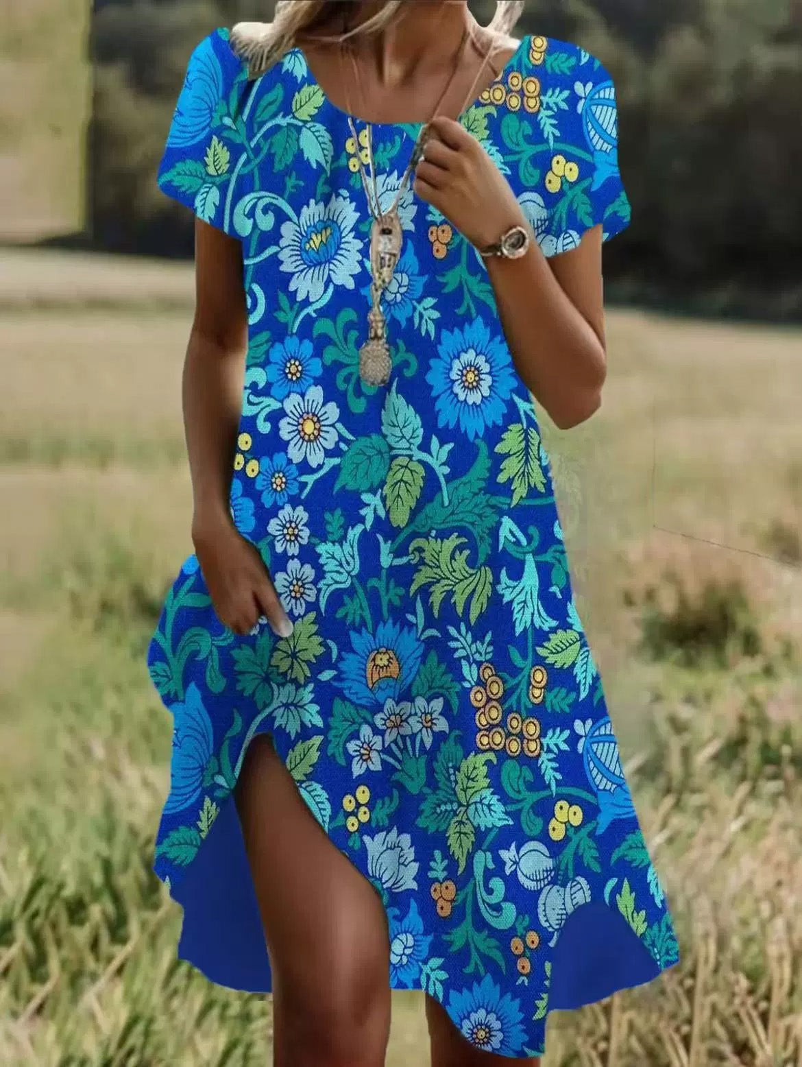 Blue floral bohemian summer dress, round neck, short sleeves, mid-length with side slit