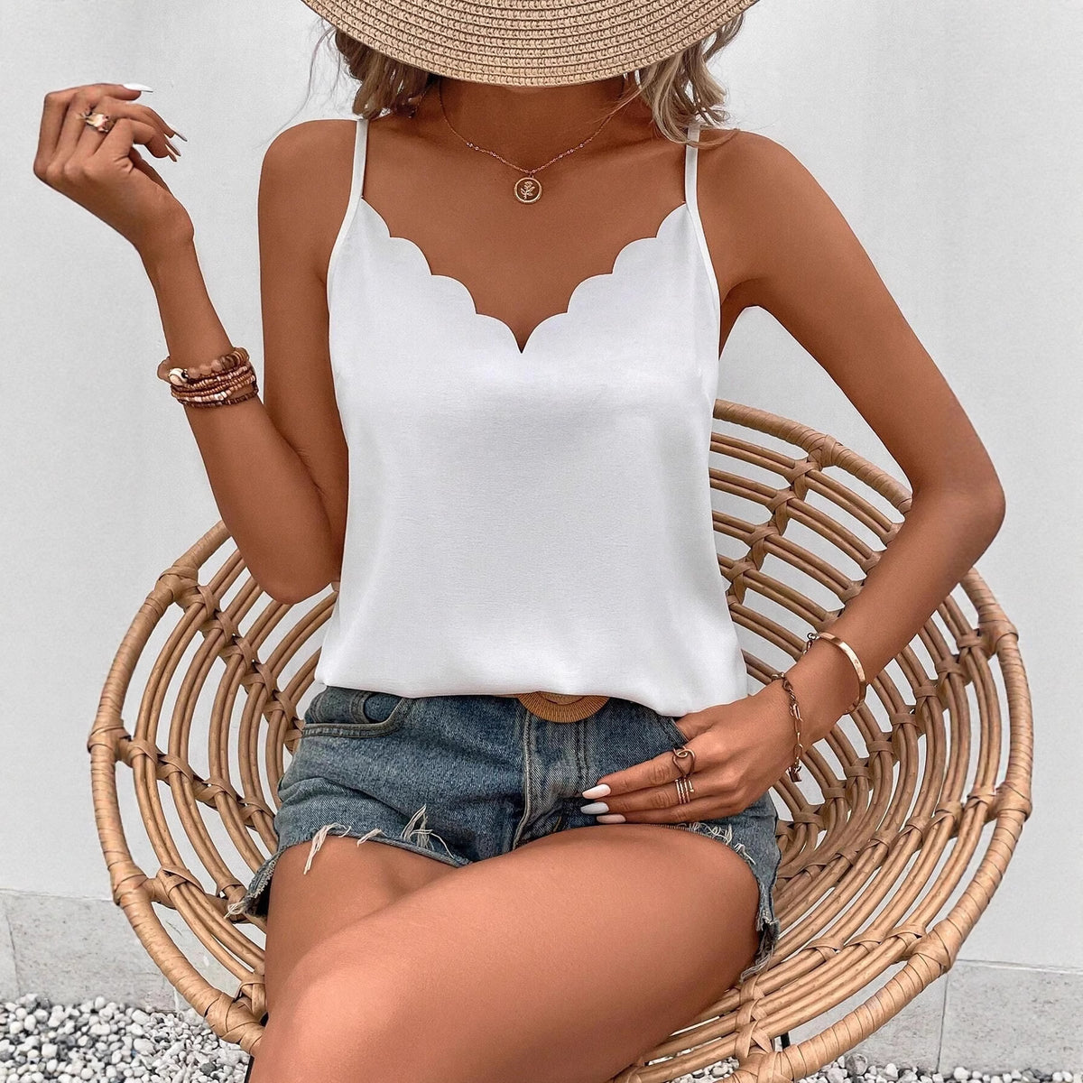 White scalloped V-neck fitted tank top with spaghetti straps