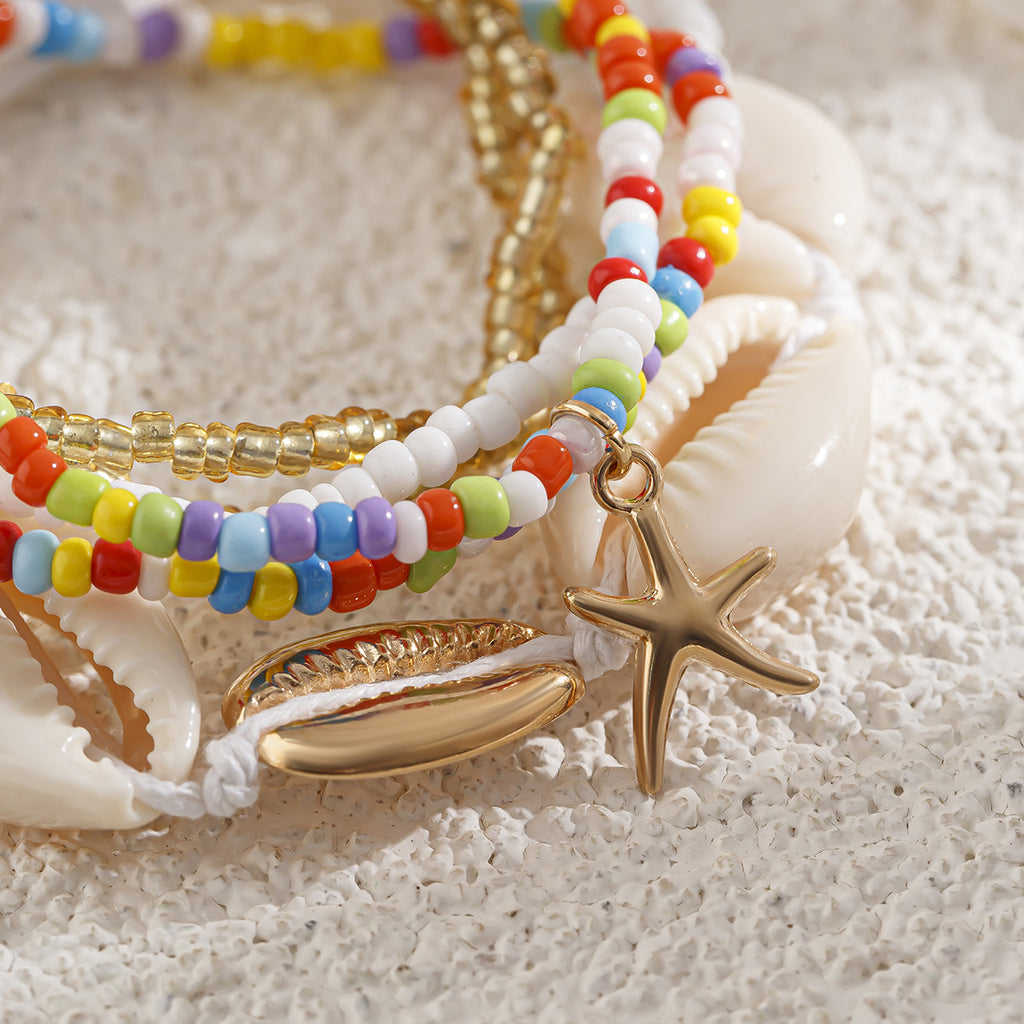 Star Island shell bracelet set with rainbow beads, gold-tone starfish and shell charms