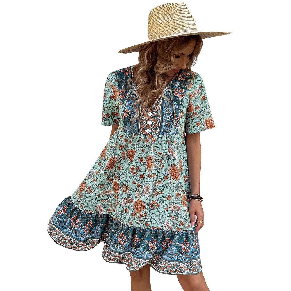 Teal floral V-neck boho dress with short sleeves and ruffled tiered hem