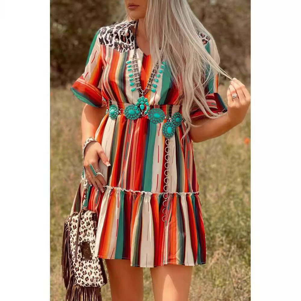 Colorful vertical striped short-sleeve dress with turquoise pom-pom neckline