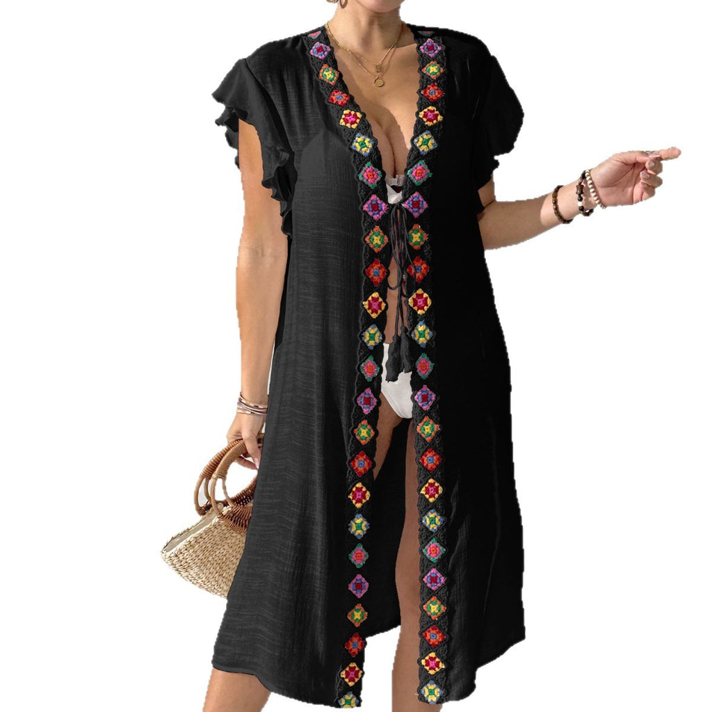 Black womens beach cover-up with V neckline and colorful embroidered trim, flutter sleeves