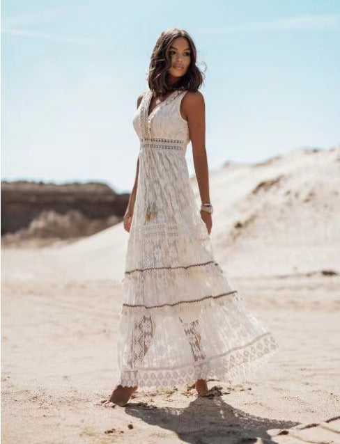 White lace maxi dress with tiered skirt and patterned bands, sleeveless V-neck