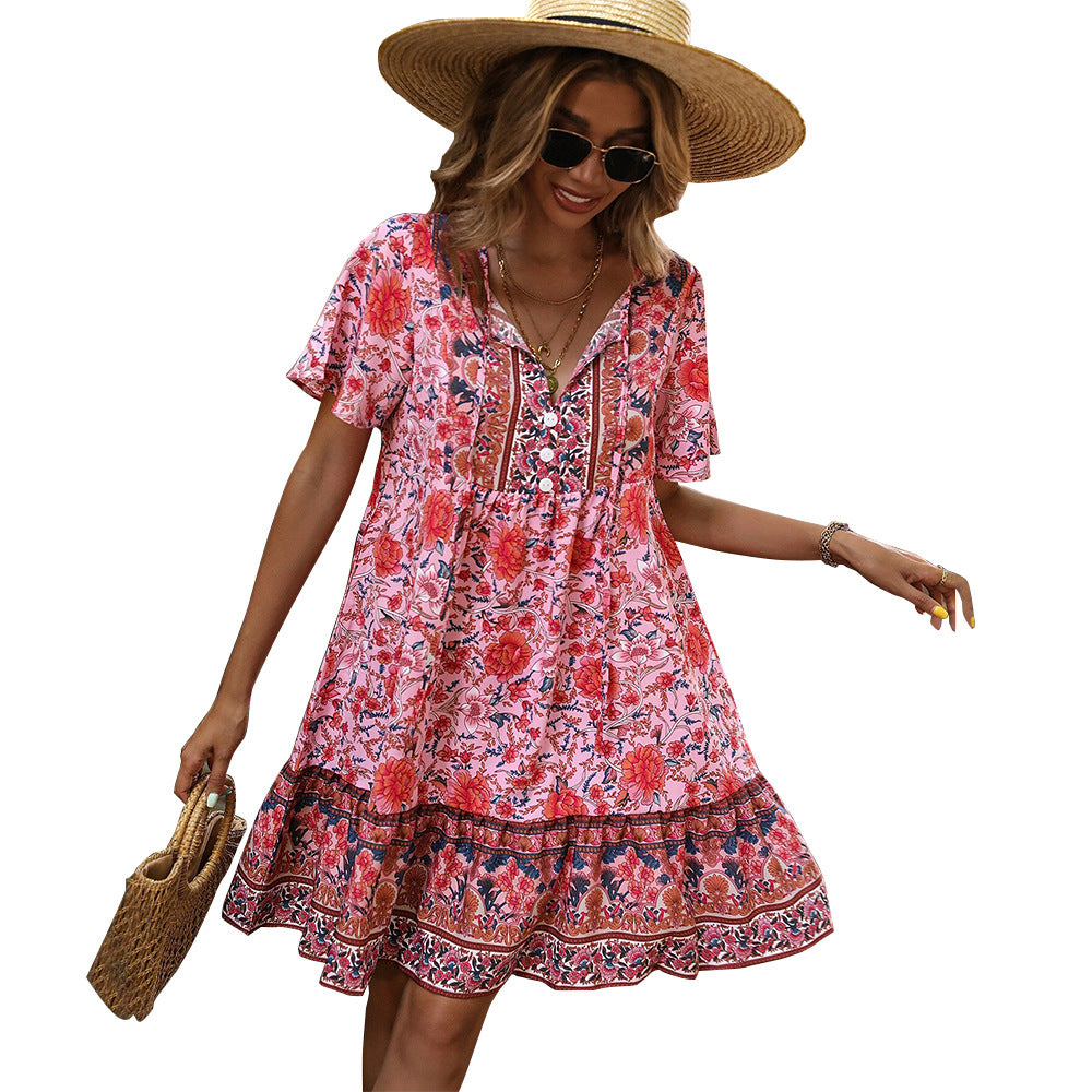Red floral V-neck boho dress with short sleeves and tiered ruffle border hem