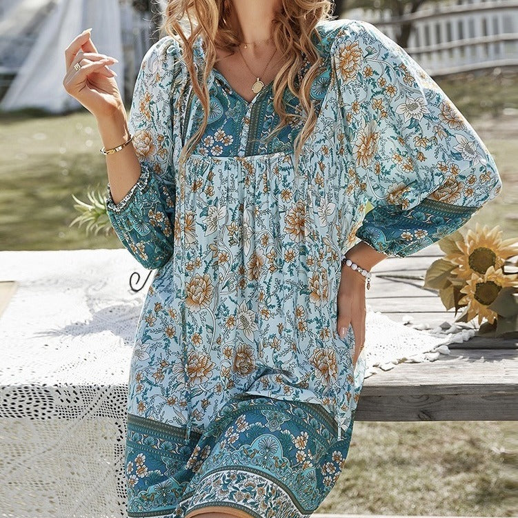 Bohemian printed long-sleeve A-line dress with V-neck lace-up detail, teal floral print