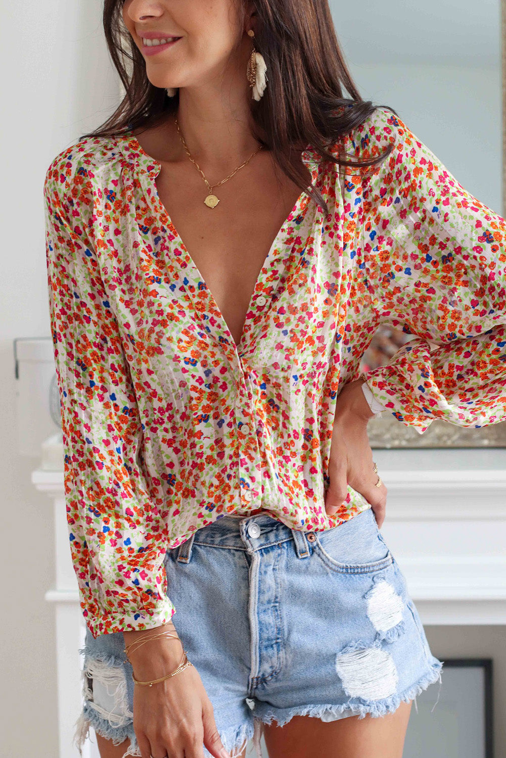 Multicolor floral button-front blouse with deep V-neck and ruched puff sleeves